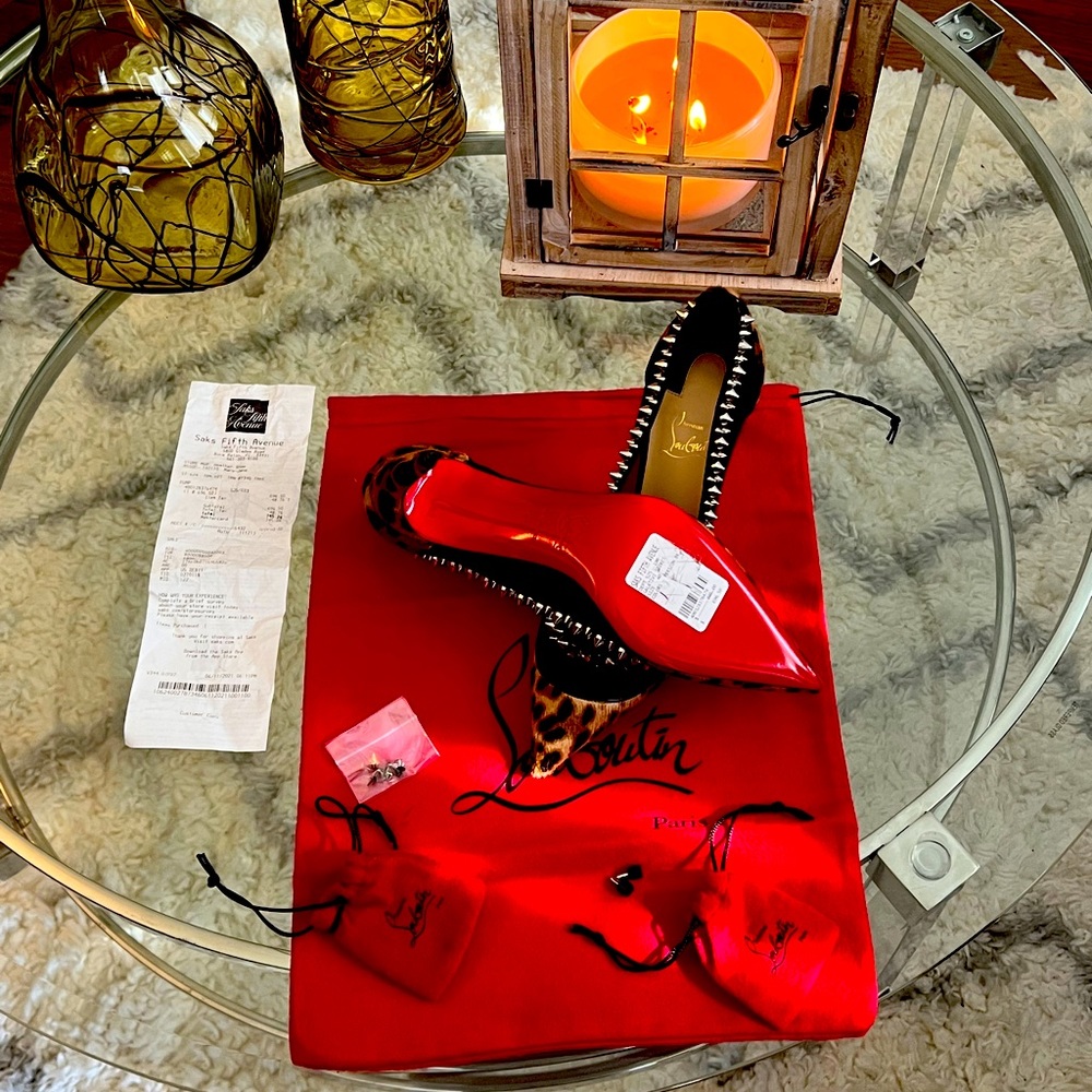 NWT Christian Louboutin. Size 40. Comes w/ dust bags, box, spikes & heels.